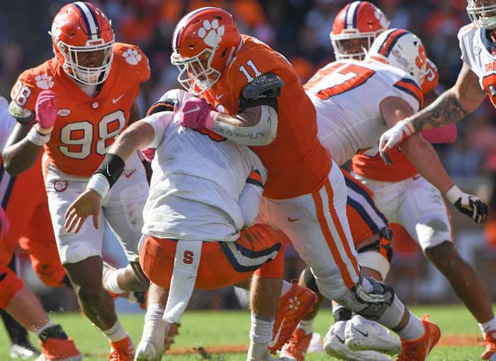 Oct 22, 2022; Clemson, SC, USA; Clemson defensive lineman Bryan Bresee (11) sacks Syracuse quarterback Garrett Shrader (6) during the fourth quarter at Memorial Stadium in Clemson, South Carolina on Saturday, October 22, 2022. Mandatory Credit: Ken Ruinard-USA TODAY Sports